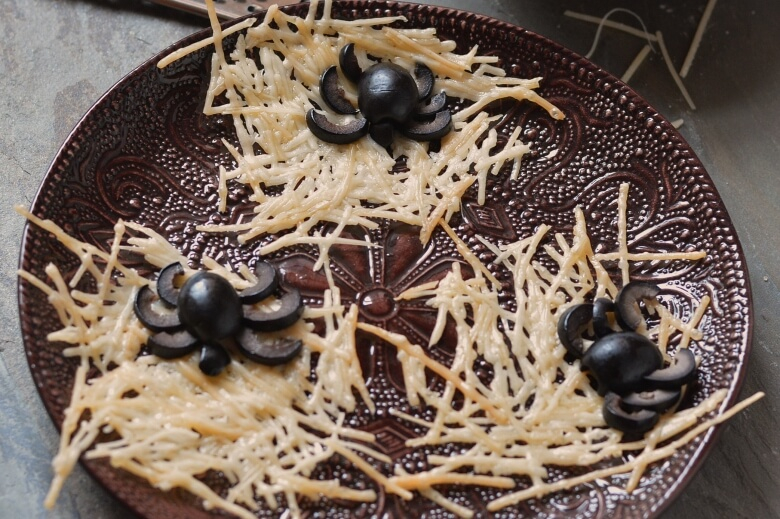 Parmesan Cheese Crisps with Black Olive Spiders Featured Image